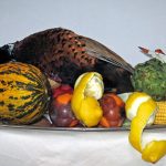 Still life with pheasant and fruit